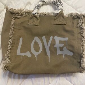 Hipchik Tan Tote, new, no stains, pet/smoke free home, cleaning out closet